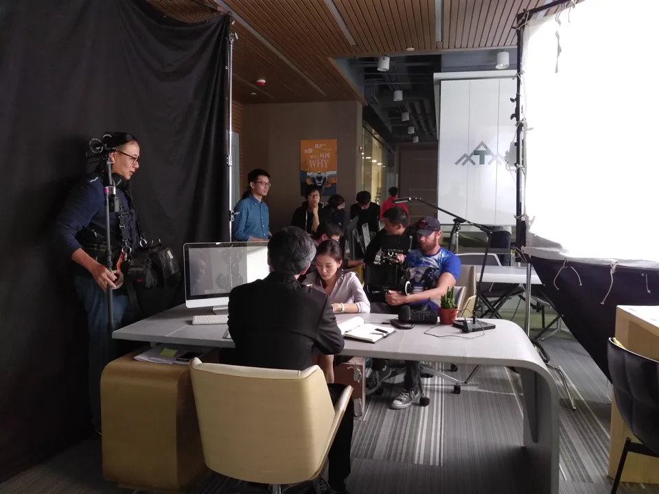Corporate interview crew filming an internal brand story in China